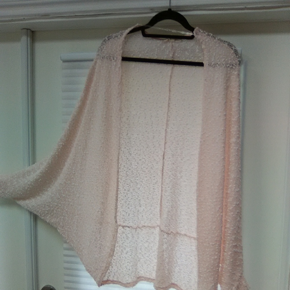 A pink shrug